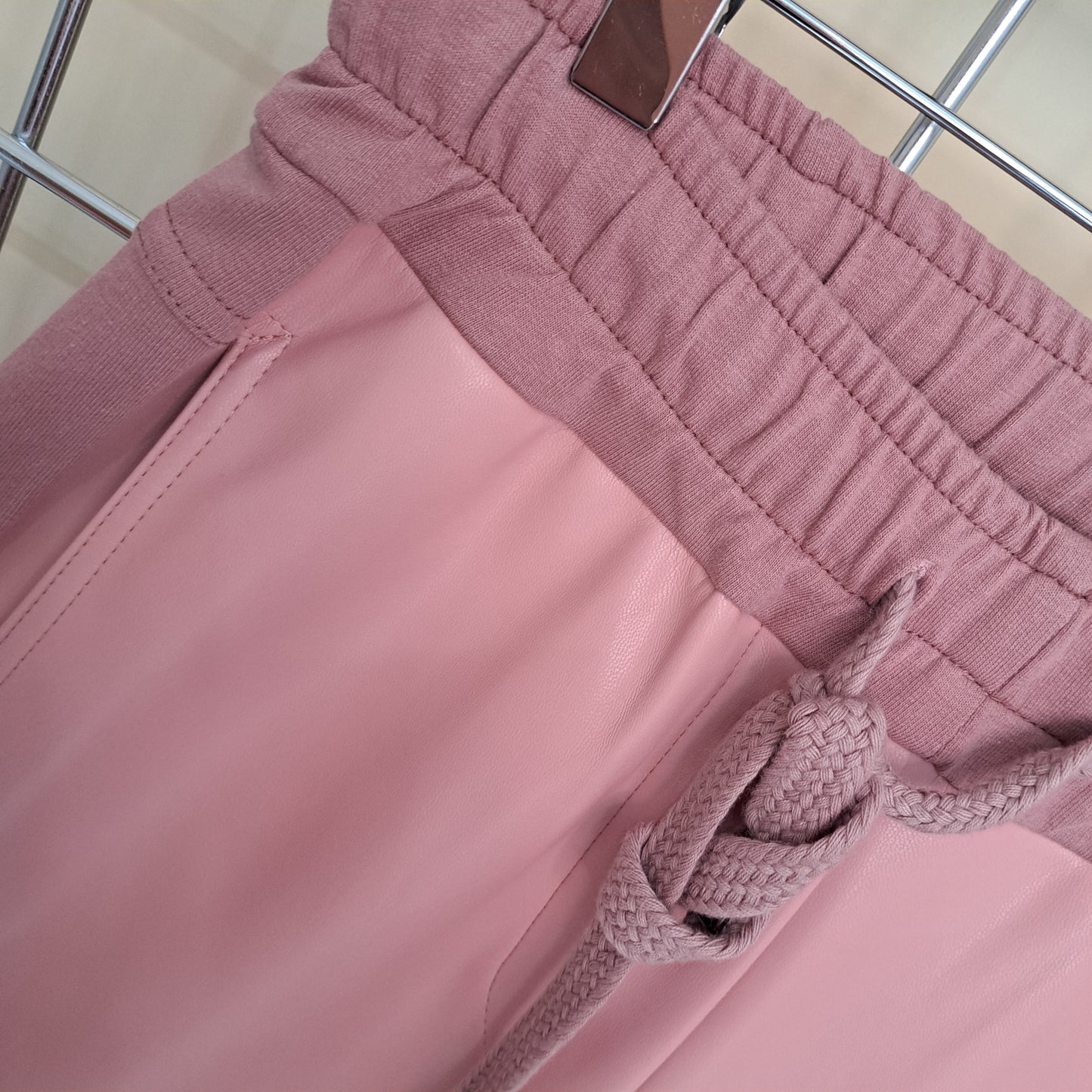 Half pleather trousers
