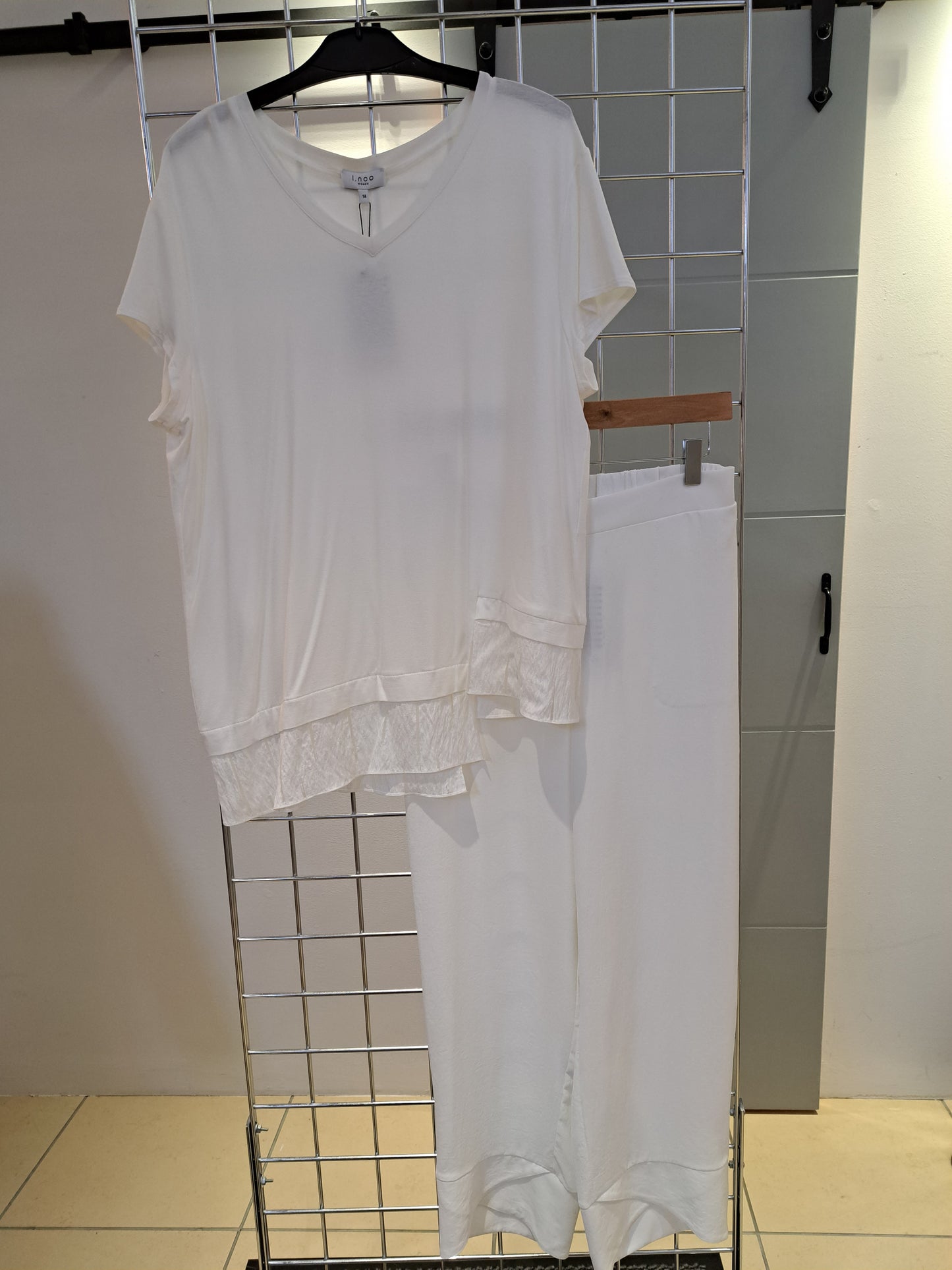 Off white tulip hem trousers - Maya Maya Ltd